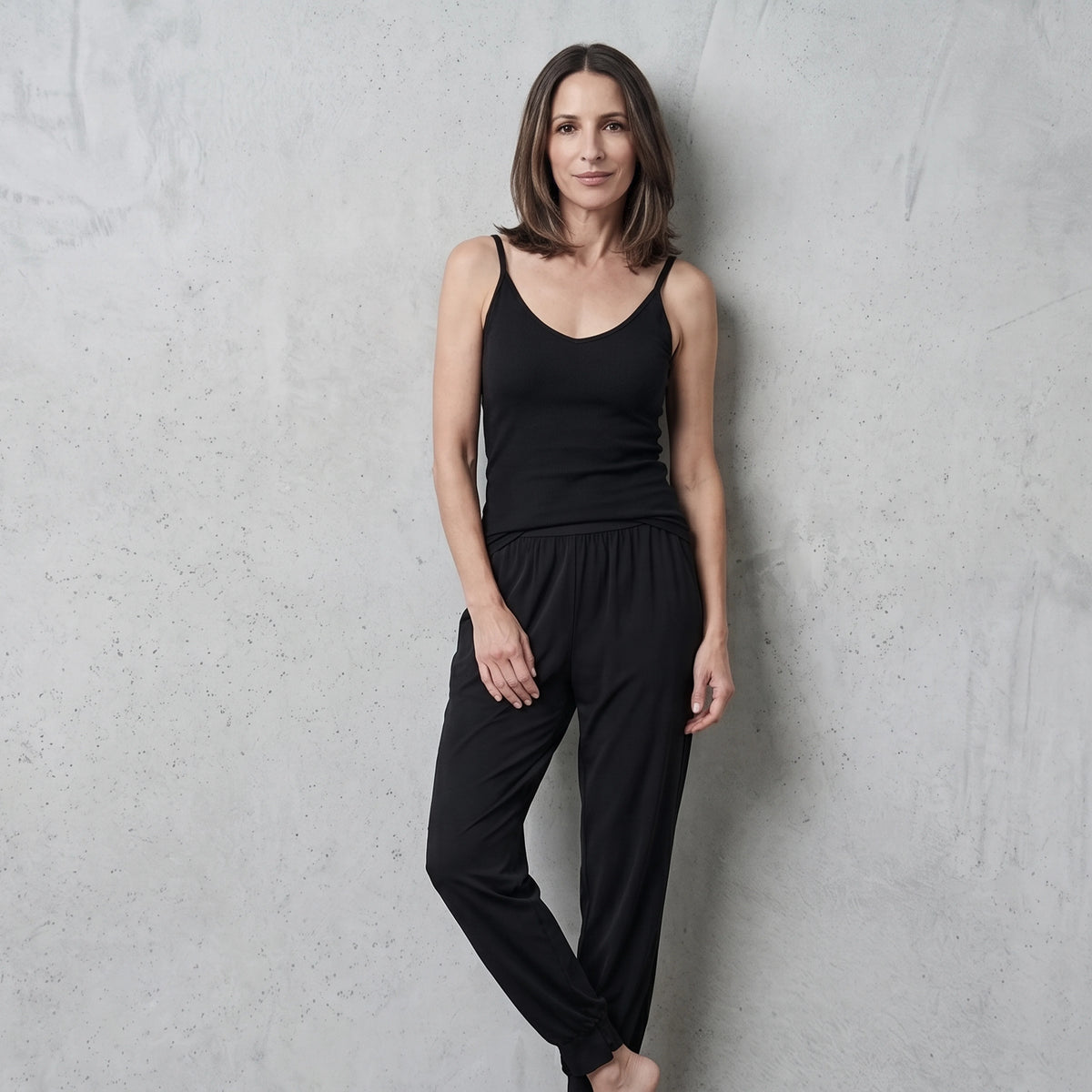 Le monde des hiboux jersey jogger pants in black with a wide high waistband, styled with a black camisole